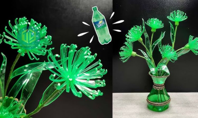 Cay c?i và hoa t? chai nh?a